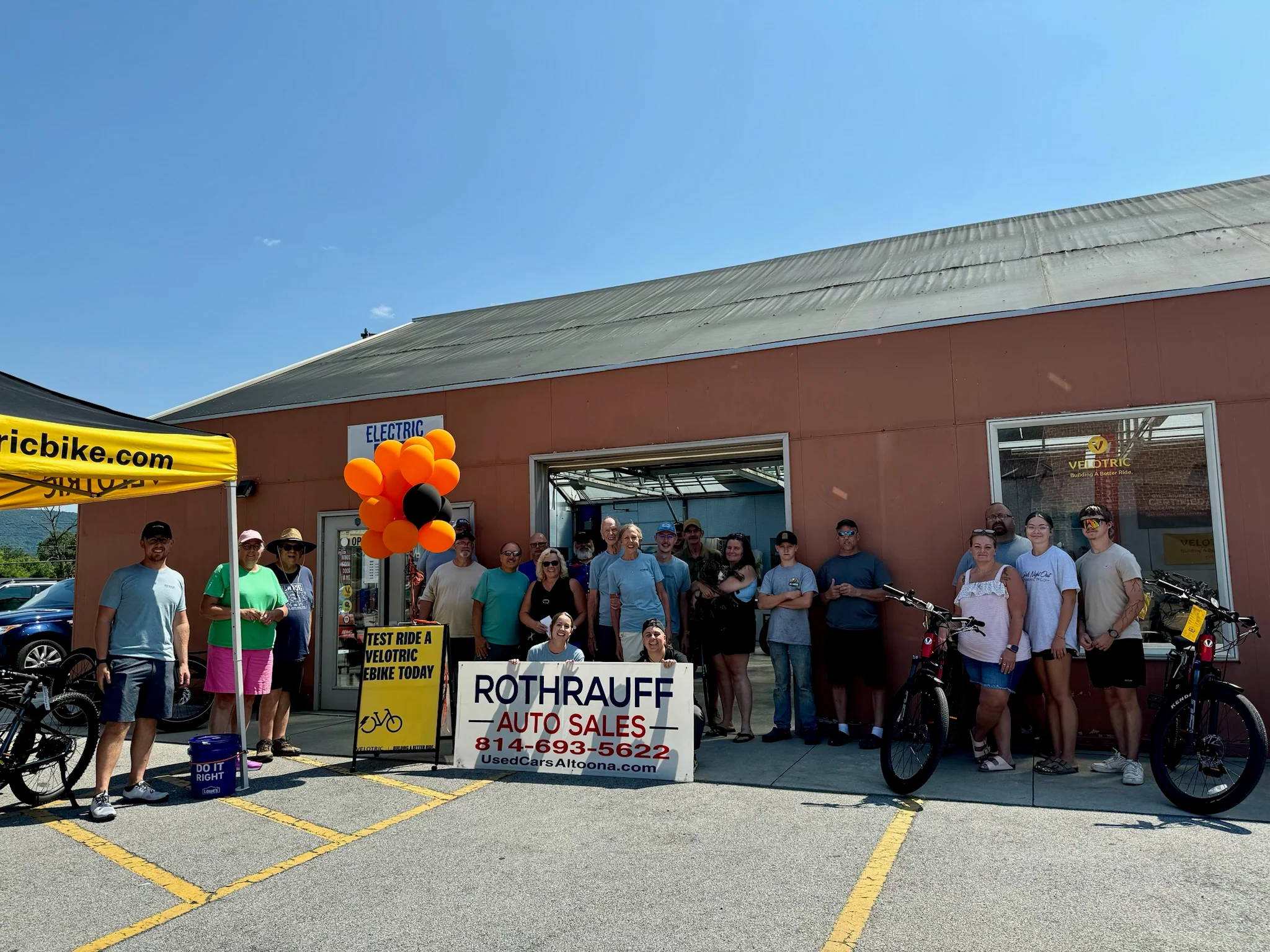 Our family and friends together with the Rothrauff Auto Sales sign